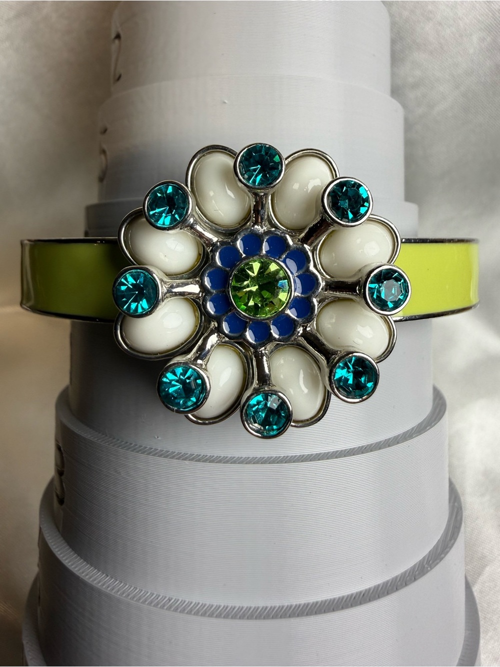 Lia Sofia “Full Bloom" floral stretch bracelet featuring lime green enamel band